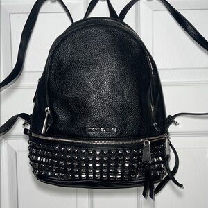 Michael Kors Black Leather Backpack with Silver Accents